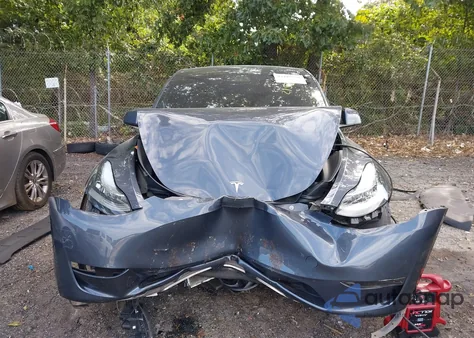 2023 Tesla Model Y Awd/Long Range Dual Motor All-Wheel Drive from USA, damaged, VIN 7SAYGDEE6PA052156